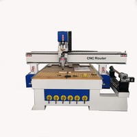 Machine de gravure CNC rotative 4 axes 1325 avec système de contrôle RichAuto, moteur à broche unique, composants essentiels pour les pieds de table en bois
