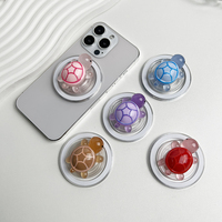 Support magnétique de poignée de téléphone de tortue de lueur mignonne dans le noir Mini résine rétractable pliant aimant de tortue poignée de téléphone portable