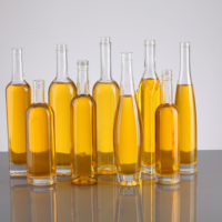 Bouteille transparente personnalisée en verre nouveau vide rond 500ml boissons bouteilles de liqueur de fruits bouchon en liège bouteille de vin pour esprit vodka Gin