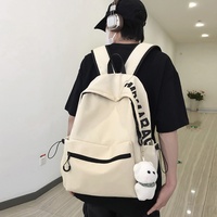 Sac à dos unisexe léger en denim au design tendance pour étudiants et lycéens, avec fermeture éclair et doublure en polyester