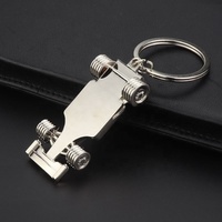 Großhandel Metall-Autoschlüsselanhänger Souvenir 3D F1 Auto-Form Schlüsselanhänger Kundenspezifisch Stilvoll OEM Verfügbar Rennwagen-Schlüsselring Endbenutzer-Schlüsselanhänger