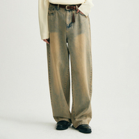 Jean baggy droit tendance 2026, délavage effet usé, bleu clair avec reflets jaunes, ourlet déchiré, pour homme, idéal au quotidien