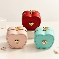 Boîte à bijoux créative en forme de pomme, boîte de rangement pour bagues en cuir PU de luxe, cadeau de noël et de saint-valentin