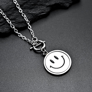 This Instagram-worthy rotating necklace features a sad/laughing face design, is unisex, and has a unique, niche design. It's a c - Product Image 4