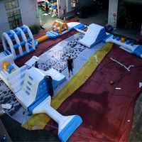 Parc aquatique gonflable géant en PVC de 0,9 mm, parcours d'obstacles aquatiques commercial pour les centres aquatiques