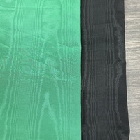 Nouveau design Tissu polyester moiré en stock Tissu fini effet moiré Tissu gaufré à effet visuel 3D pour robes et sacs
