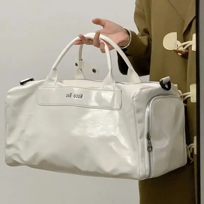 नई लघु ढोना यात्रा बैग पुरुषों बड़ी क्षमता सामान व्यापार खेल फिटनेस बैग महिला निर्माताओं प्रत्यक्ष बिक्री पर