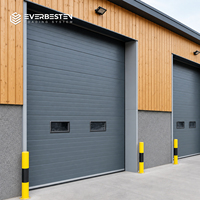 Porte sectionnelle industrielle en acier Everbesten, panneaux isolés de 40 à 100 mm, protection anti-chute, fonctionnement manuel/électrique