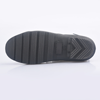 Sepatu Bot Hujan Stylish Anti Air Model Tinggi dengan Latar Belakang Hitam dan Motif Sapi Putih