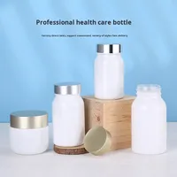 Pots en verre de qualité alimentaire finition givrée pour poudre de médecine bonbons suppléments santé capsules épaisses bouteille de distribution en plastique