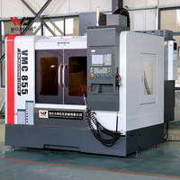 Centre d'usinage vertical WOJIE VMC855 pour le fraisage de moules de précision avec corps en fonte rigide et haute précision de positionnement
