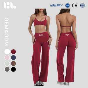 Nuevo conjunto de yoga transfronterizo con sujetador halter push-up realzador de busto y pantalones deportivos de fitness de secado rápido, conjunto de dos piezas para Pilates, color liso. - Product Image 1