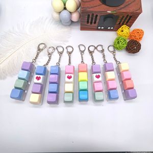 Porte-clés mécanique carré à quatre touches, anti-stress, en PVC, couleurs macaron, jouet coloré, vente en gros, best-seller - Product Image 2
