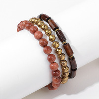 Großhandel Trendiges Herren-Armband-Set Stapelbare Naturstein-Holzfassperlen 8mm Tigerauge Goldakzent 19cm für Männer