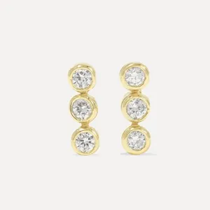A row of three bezels set with brilliant diamonds 18k Gold Moissanite diamond Earring