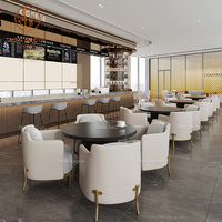 Ensemble de mobilier moderne pour café, restaurant, deux tables rondes en bois et quatre chaises en cuir blanc, canapé en tissu