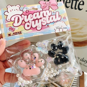 ของเล่นบีบลดความเครียดรูปอุ้งเท้าแมวสีดำแบบคู่ ขายส่ง - Product Image 1