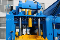 Machine à fabriquer des briques en ciment entièrement automatique KAIDONG QT12-15 avec boîte de vitesses et roulement, facile à utiliser