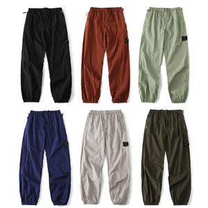 Pantalon décontracté ample pour homme, style hip-hop, avec patch brodé de marque de créateur, motif boussole, en nylon, avec détails métalliques et pierres, imperméable et réfléchissant, style islandais - Product Image 2