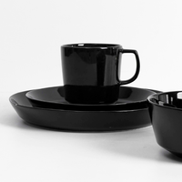 Nouvelle conception, porcelaine fine, couleur noire, incrustation dorée sous glaçure, service de table moderne anti-fuite, logo personnalisé, ensembles de vaisselle en céramique