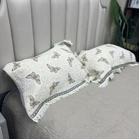 Vente en gros usine Housse de coussin carrée 100% chanvre motif papillon teinte en fil avec pompons pour salon ou hôtel