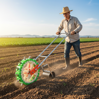 Semoir manuel portable à pousser à la main, idéal pour l'agriculture à petite échelle, machine de plantation fiable et universelle pour maïs et graminées