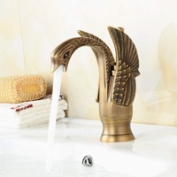 Robinet de lavabo de salle de bain en laiton de luxe, style vintage classique, forme d'animal, col de cygne, doré
