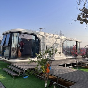 บ้านคอนเทนเนอร์สมัยใหม่สำหรับใช้เป็นโรงแรม พร้อมหน้าต่างขนาดใหญ่และพื้นระเบียงไม้สำหรับพื้นที่ใช้สอยกลางแจ้ง - Product Image 1