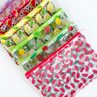 Vente en gros de sacs à crayons transparents en PVC imprimés Trousse à crayons créative Sac de rangement cosmétique multifonctionnel mignon Portefeuille zéro clair