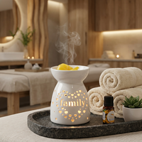 Ensemble de brûleurs d'huiles essentielles en céramique blanche de style nordique minimaliste avec motif étoilé ajouré, porte-bougie pour la décoration de la maison et le spa