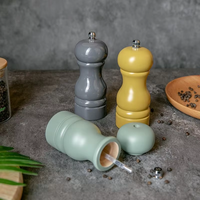 Moulin à poivre manuel compact et élégant ensemble de moulins à sel et à poivre en céramique de couleur macaron en bois pour un usage domestique