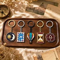 Porte-clés de voyage très populaire, motif timbre poste aérien, sablier, montgolfière, ornement décoratif en émail pour sac et voiture, porte-clés personnalisé