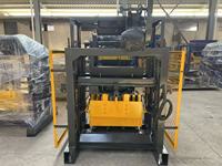 Machine à fabriquer des blocs creux en béton YaoDa QTJ 4-40 avec moteur, pression hydraulique et utilisation facile