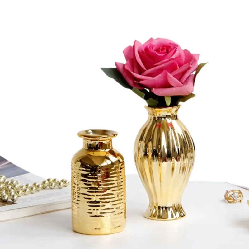 Stile europeo luce di lusso dorato vaso di rilievo Vintage per la decorazione per la casa tavolo piccoli vasi di fiori in ceramica