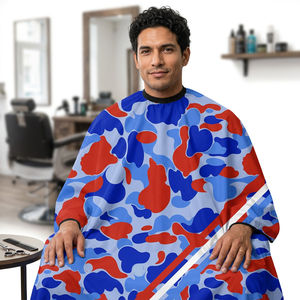 Capa de Peluquería Impermeable con Estampado de Camuflaje Rojo, Blanco y Azul para Profesionales de la Peluquería - Product Image 1