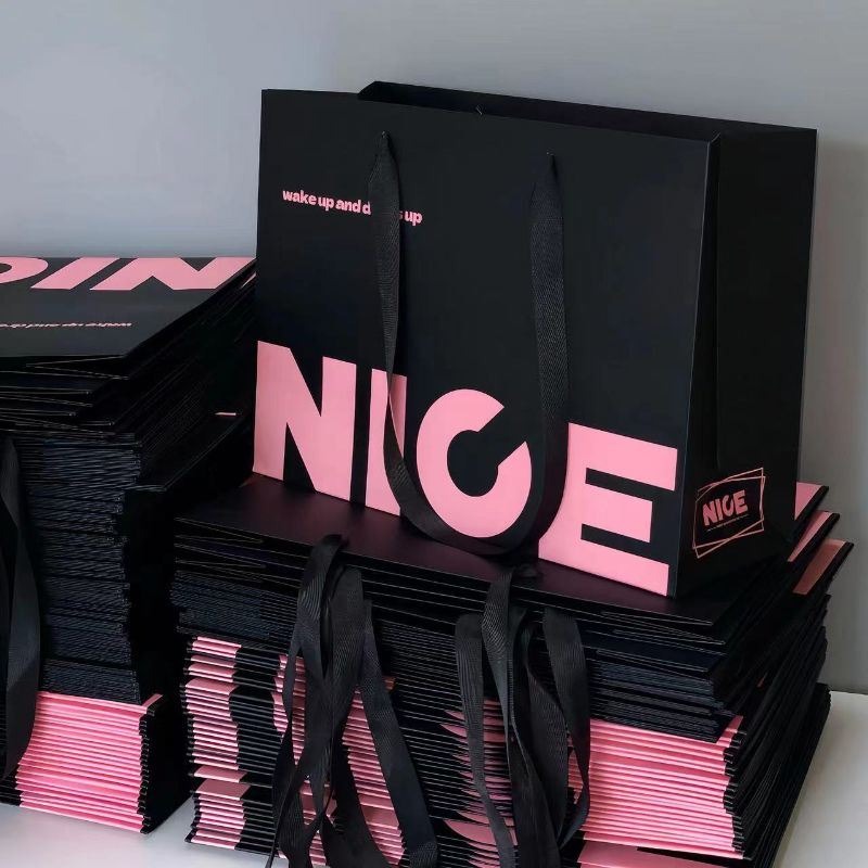 Wholesale Environmental Protection Custom Own Brand Logo Luxury Fine Powder Black Clothing Packaging Paper Bag