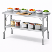 Table de travail industrielle pliable robuste avec cadre stable en acier inoxydable et pieds renforcés pour la restauration et la cuisine