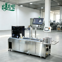Machine de marquage laser volante UV BMG 5-en-1 automatisée avec système d'inspection par vision haute précision pour marquage QR sur sacs plastiques ultra-fins