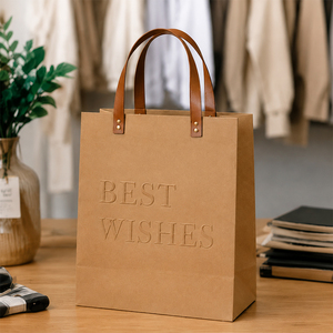 Sacs en <span class=keywords><strong>papier</strong></span> cadeaux pliables personnalisables avec lettres gaufrées <span class=keywords><strong>grossiste</strong></span> <span class=keywords><strong>sac</strong></span> emballage <span class=keywords><strong>papier</strong></span> kraft poignée en cuir - Product Image 2