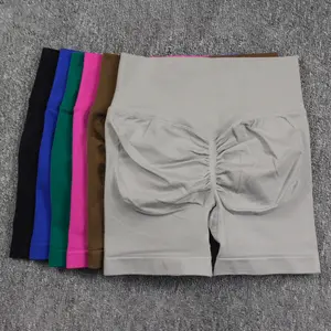 Pantalones cortos sin costuras con logotipo personalizado para mujer, pantalones cortos ajustados de cintura alta de secado rápido, transpirables, sólidos, para yoga y fitness