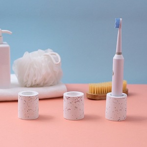 Support de brosse à dents en terre de diatomée rond absorbant pour brosse à dents électrique, personnalisé gris et blanc - Product Image 1