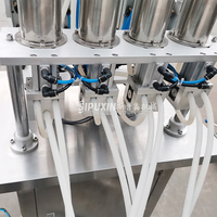 Machine de remplissage de parfum Sipuxin 4 têtes à pression négative Composants de base PLC Remplit l'huile dans l'emballage en verre Parfum aux phéromones