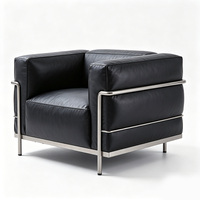 Chaise de bar avec structure en acier inoxydable poli et assise en cuir, chaise de comptoir commerciale pour café et salon