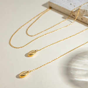 ERESI <span class=keywords><strong>Collier</strong></span> double couche infiniment coquillage <span class=keywords><strong>Collier</strong></span> plaqué or 18 carats avec long pompon en coquillage pour femmes - Product Image 4