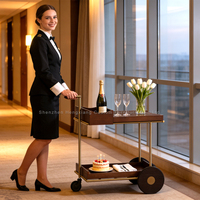 Chariot de bar roulant de luxe à 4 roues en bois et laiton, à 2 niveaux avec plateau à lattes, pour hôtel, maison et table d'appoint de salle à manger