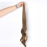 Échantillon gratuit Extensions synthétiques longues et bouclées de style flexible pour femmes