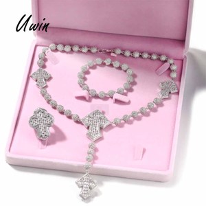 Set Perhiasan Fashion UWIN, Kalung Salib Mewah Bertabur CZ, Cincin Baguette, dan Gelang Bola untuk Pria Wanita - Product Image 1