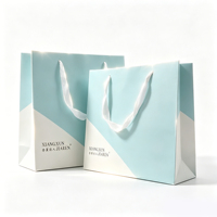 Sacs d'emballage de luxe personnalisés pour vêtements, en carton noir, écologiques, sacs de shopping avec pelliculage coloré, promotion