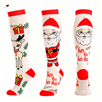 Vente directe d'usine, chaussettes de compression de Noël, OEM ODM, design personnalisé du Père Noël, chaussettes longues jusqu'au genou, adulte et enfant
