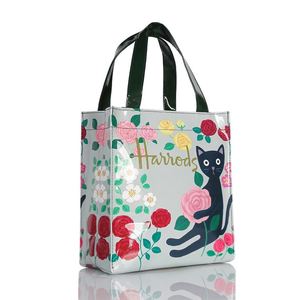 Bolsa de Mano de PVC de Lujo Personalizada de Alta Calidad con Acabado Brillante Negro Espejo, Cuero PU Impermeable, Reutilizable y de Gran Capacidad - Product Image 4